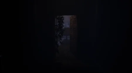 Dark hallway with overgrown vegetation looking into an illuminated room