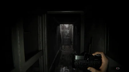 Shadows Awaken - First-person view holding a camera in a dark hallway